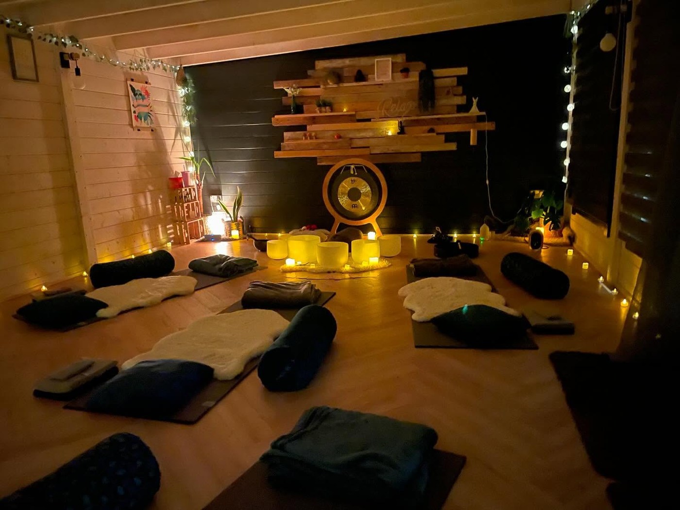 Claire’s studio lit softly for a Soundbath session